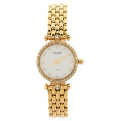 Van Cleef & Arpels Classique Orologio al quarzo in oro giallo con lunetta di diamanti