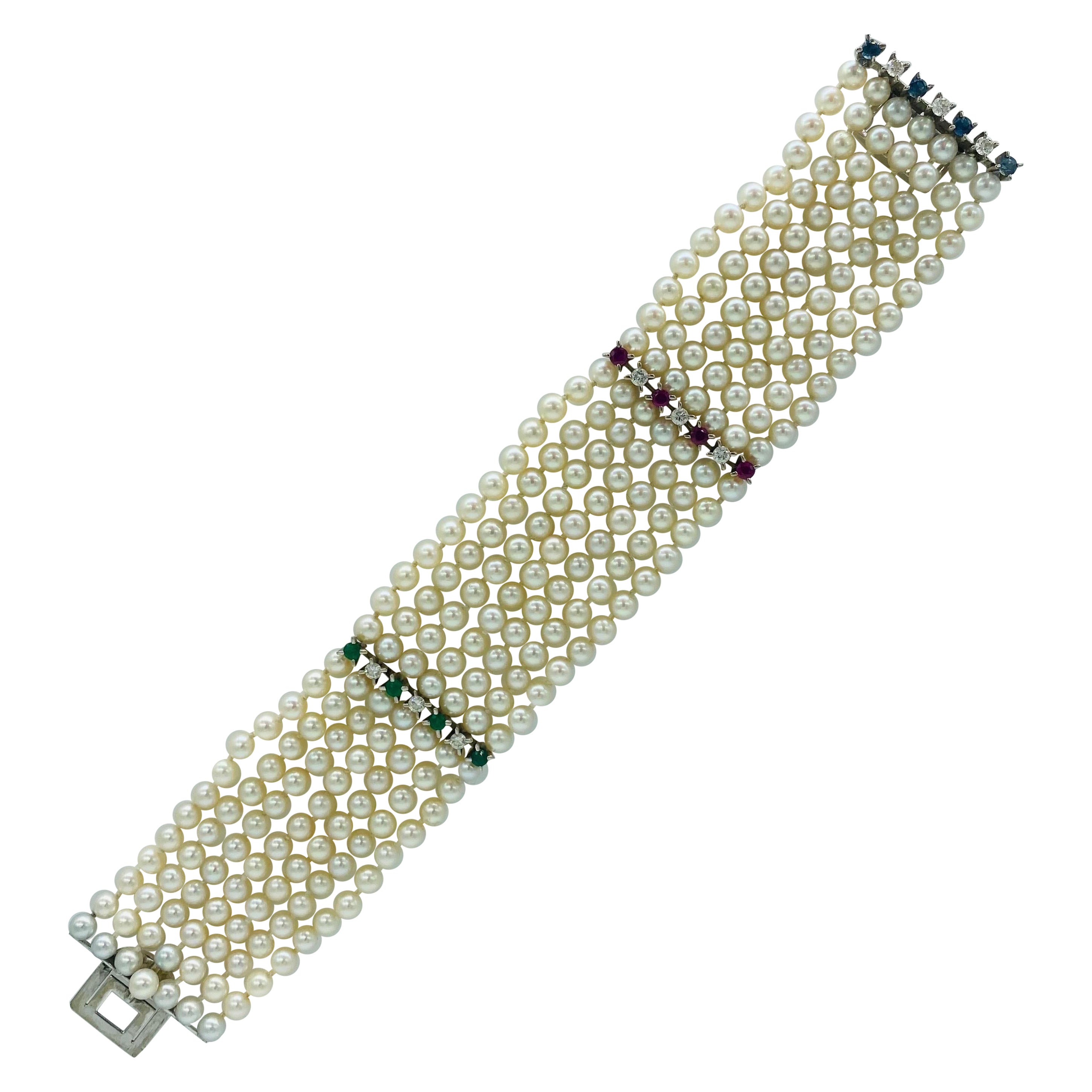 JROCA Retro 7-Row Pearls, Diamonds, Emeralds, Sapphires & Rubys Bracelet 18k For Sale