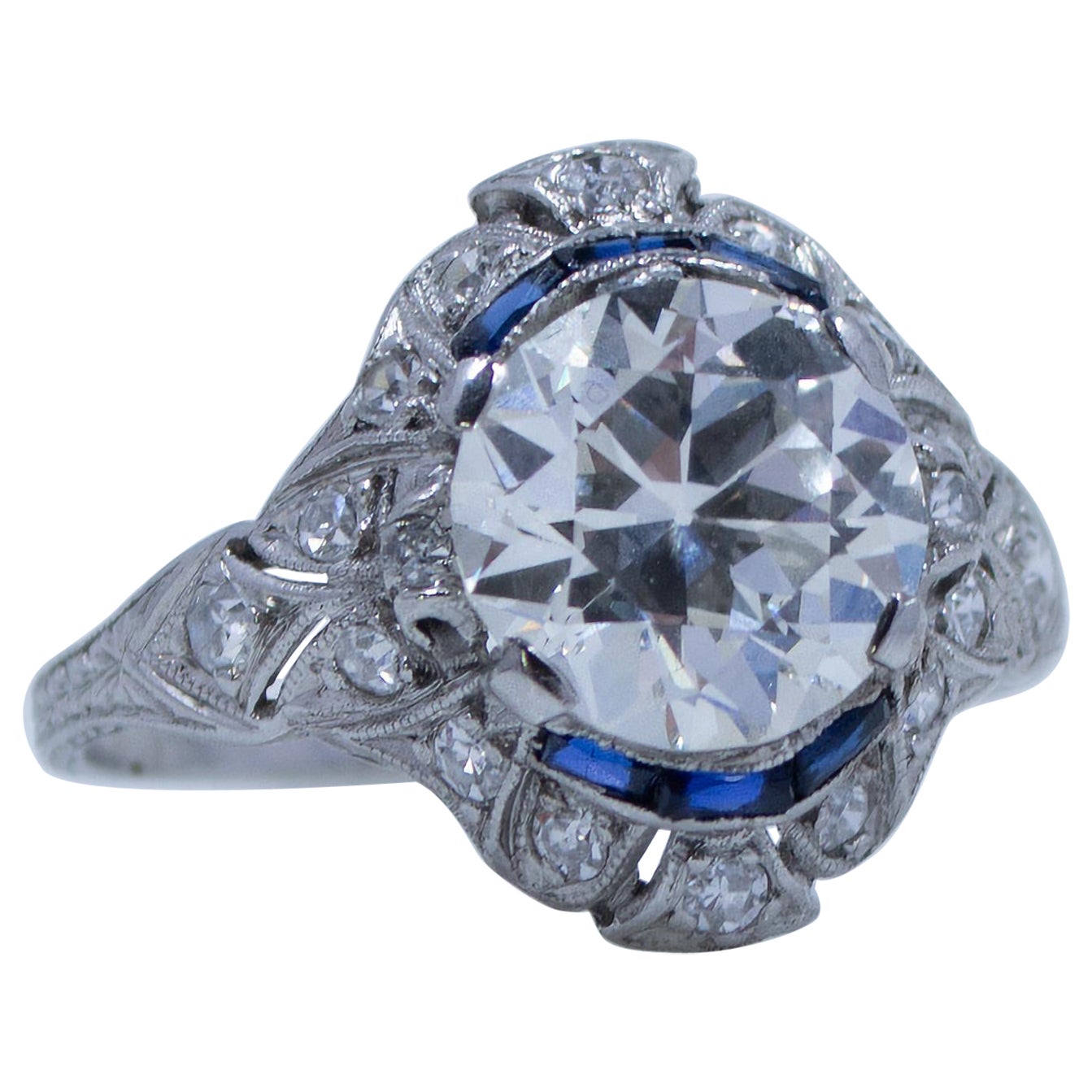 Circa 1910's Edwardian Platinum 2.34Ct Old European Cut Diamond & Sapphire Ring For Sale