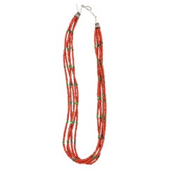 Retro Contemporary Heishi Style Coral Beaded Necklace with Five Strands.