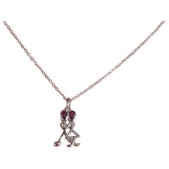 Collier pendentif en forme de bâton en argent sterling avec rubis d'un poids total de 0,24 carat