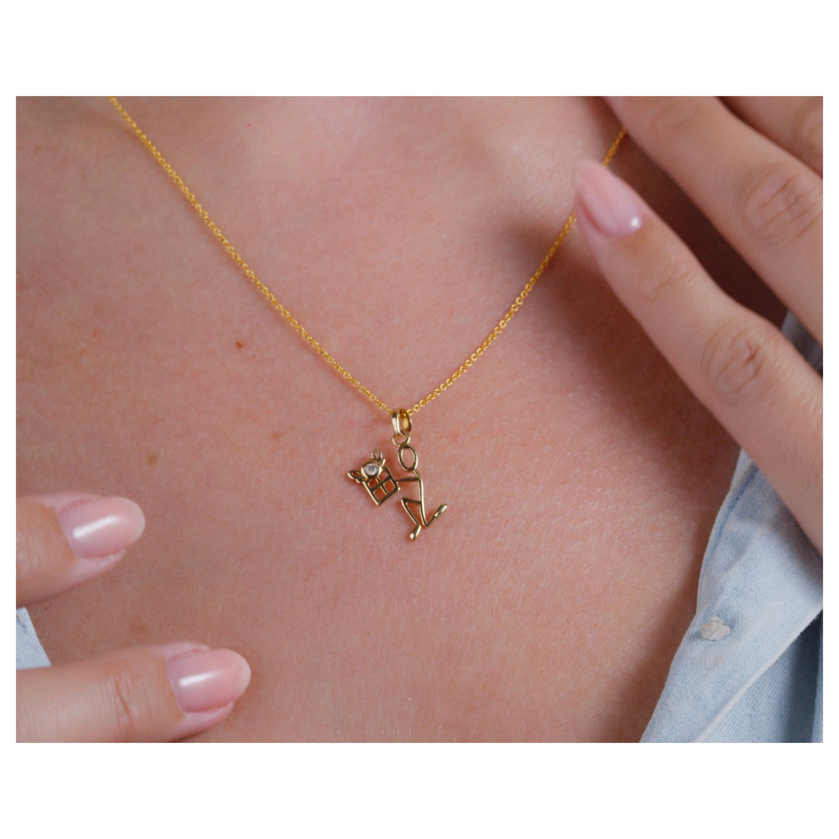 0.05 Carat Diamond Yellow Gold Stick Figure Presenting Gift Pendant Necklace For Sale
