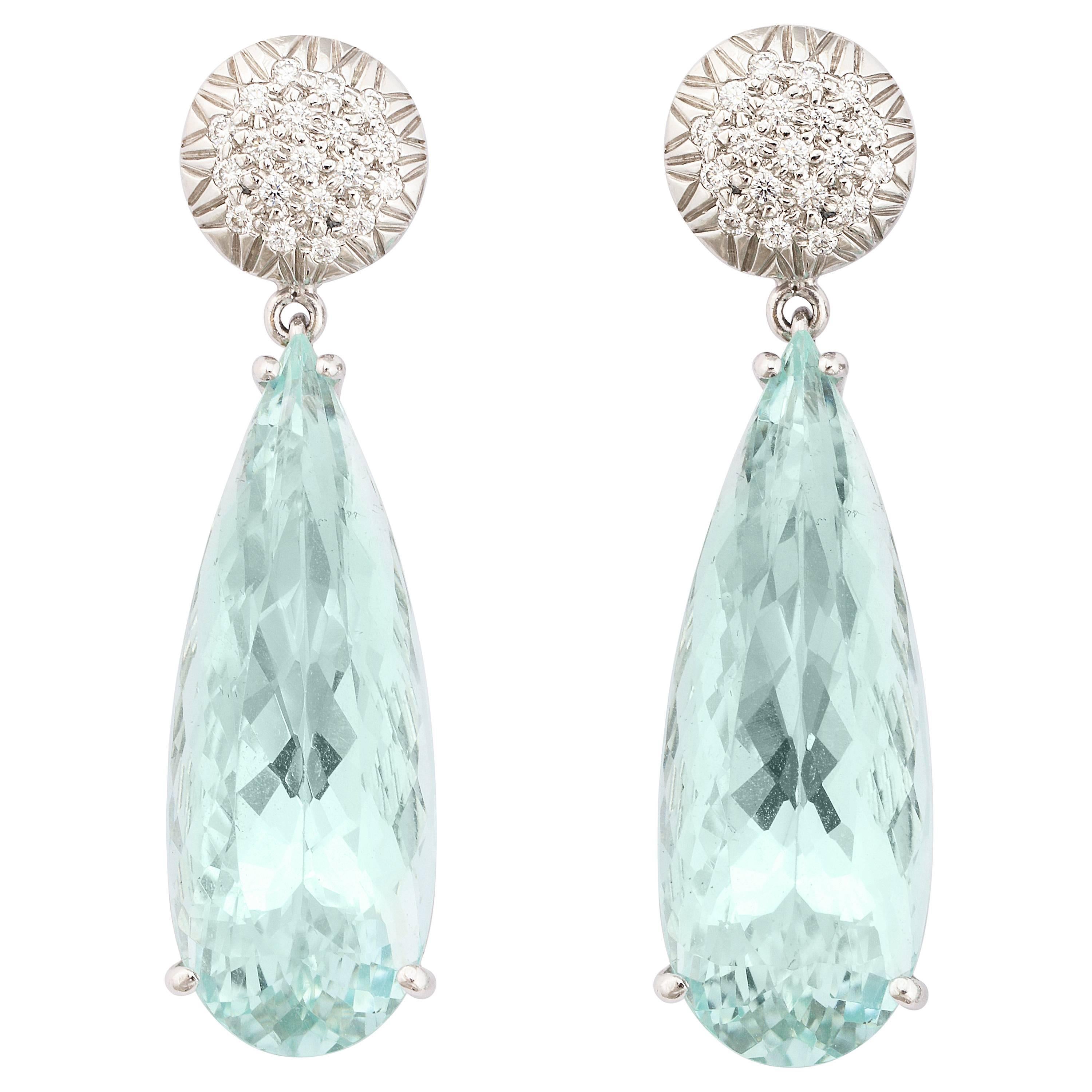 18k white gold, aquamarine and white diamonds, fancy cut earrings.