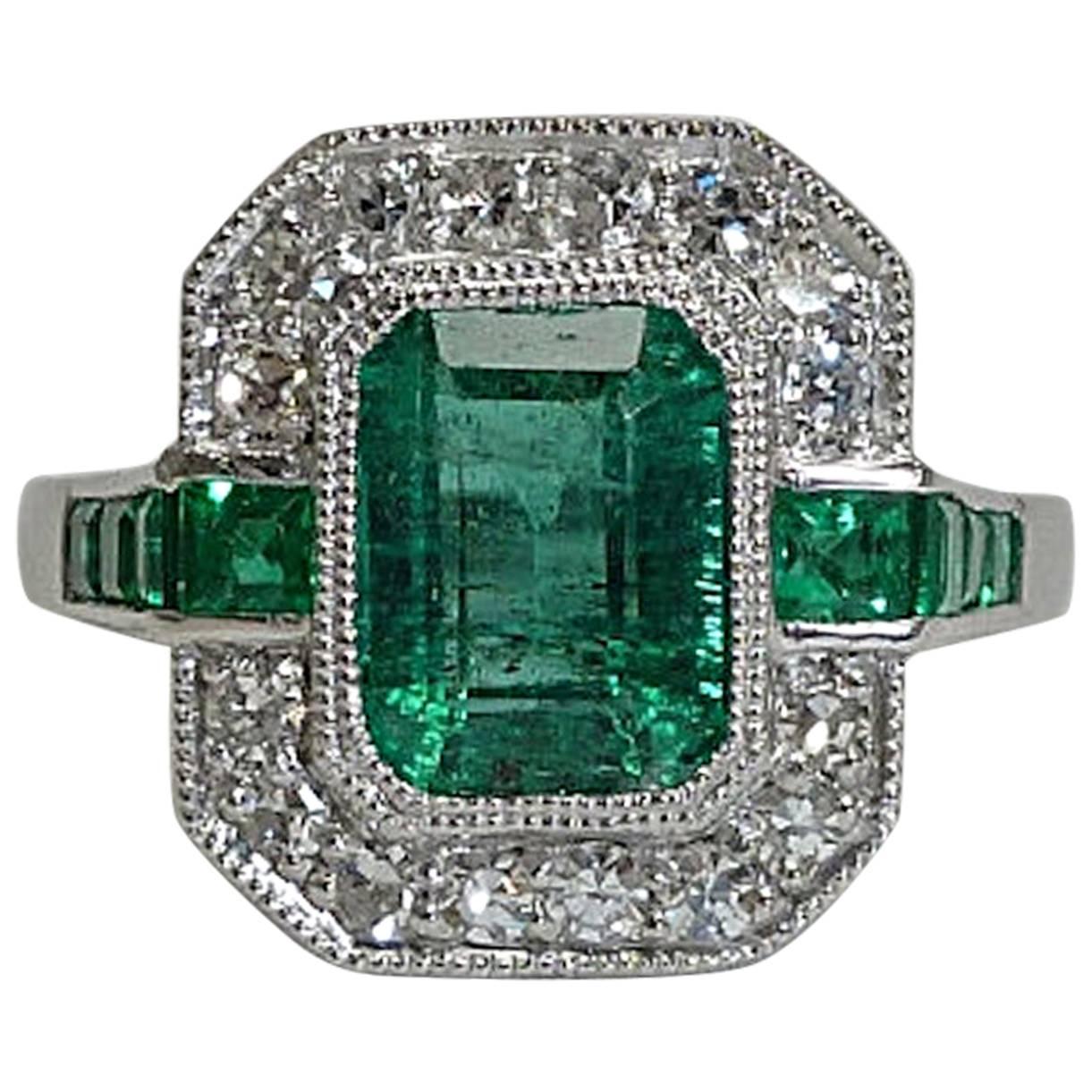 Elegant 1.84 carat Emerald Diamond Platinum Ring  For Sale