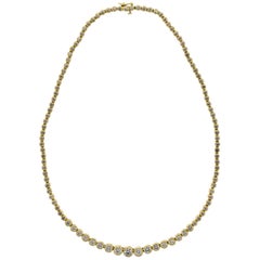 Brilliant and Dazzling Diamond and 14 Karat Yellow Gold Tennis Style Necklace