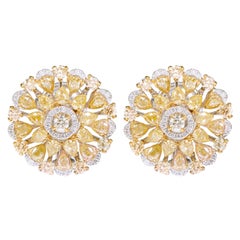 18 Karat Gold 5.69 Carat Fancy Yellow and White Diamond Solitaire Stud Earrings