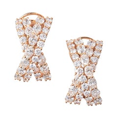 Boucles d'oreilles croisées en or rose 18k avec diamants