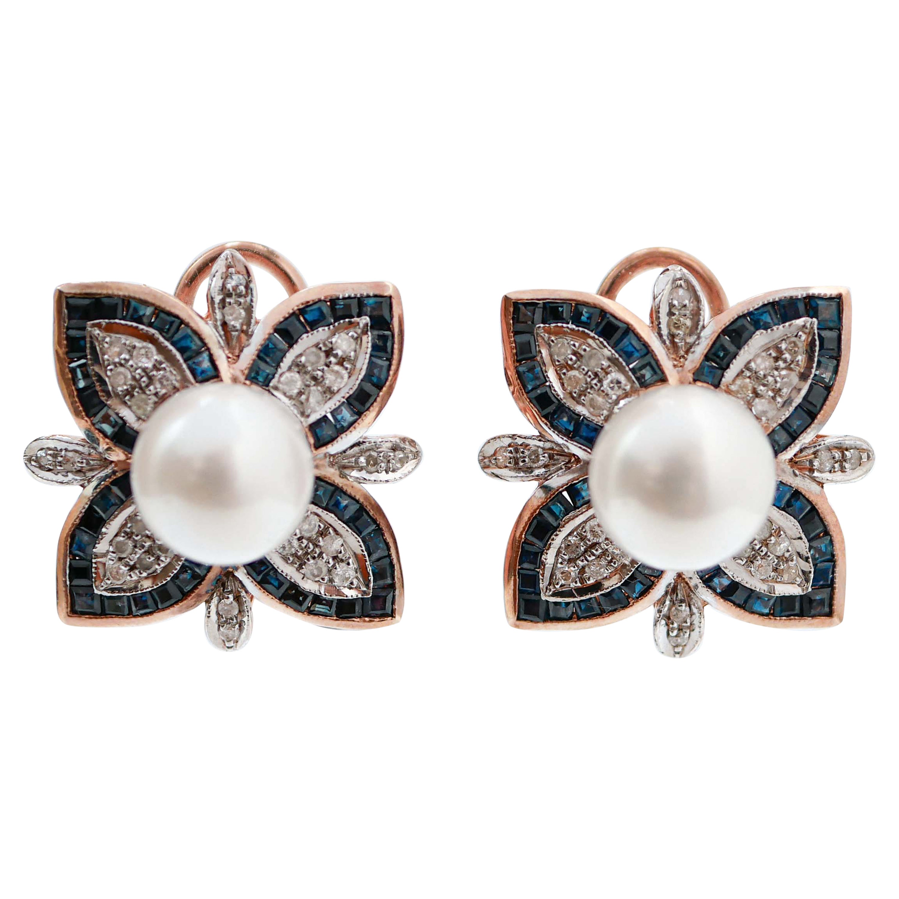 Boucles d'oreilles en or rose et argent avec saphirs, perles et diamants.