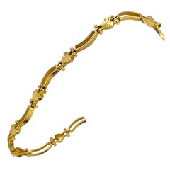 22 Karat Yellow Gold Ladies Diamond Cut Heart Link Bracelet 