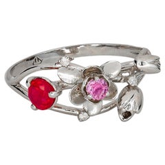 14 Karat White Gold Ring with Ruby, Sapphire and Diamonds. Orchid Gold Ring
