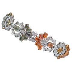 Retro Multicolor Sapphires, Diamonds, 14 Karat White and Rose Gold Bracelet.