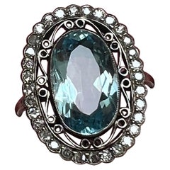 Antique Edwardian oval aquamarine and diamond ring. 