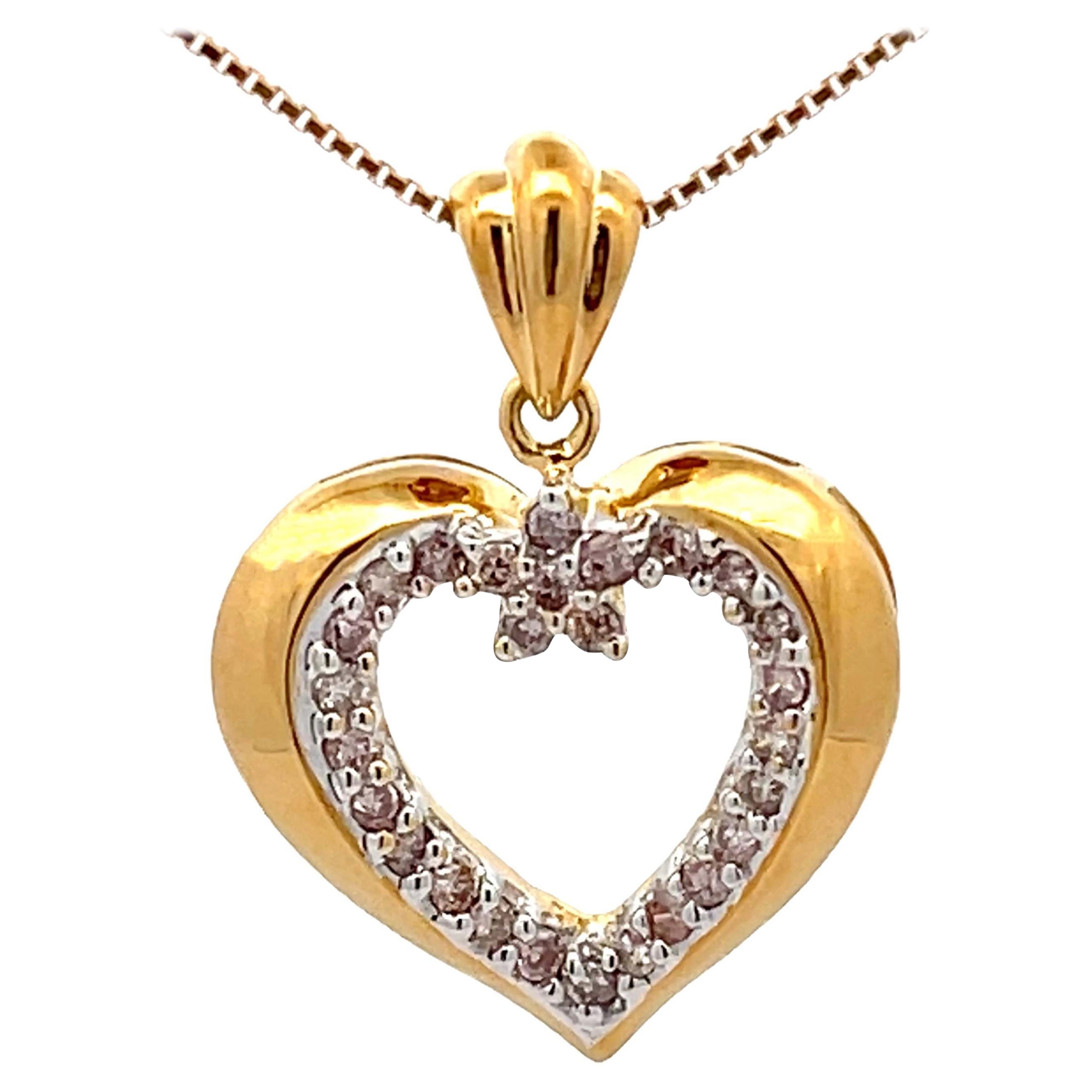 Collier en or jaune 18k avec cœur en diamant