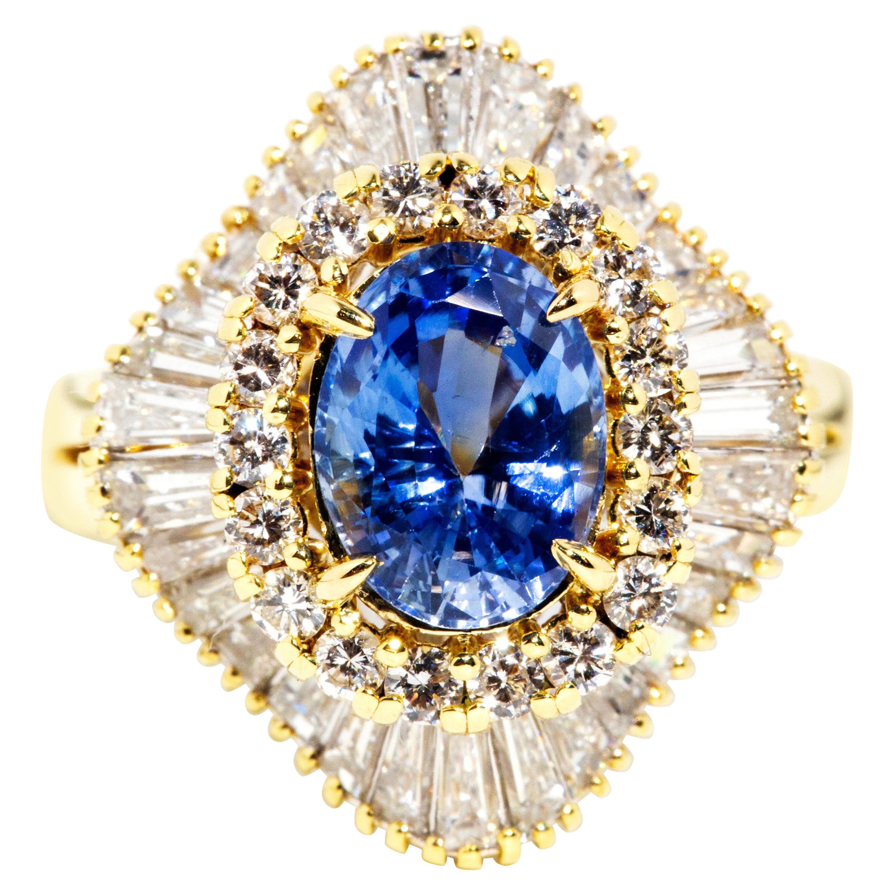 Vintage 1980s 2.23ct Oval Ceylon Sapphire & Diamond Ballerina Ring 18 Carat Gold For Sale