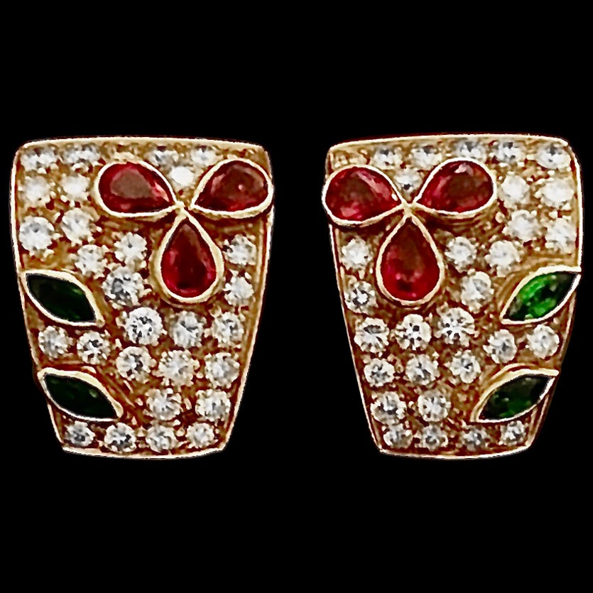 Elegant multi gem ear clips, w/ sparkling white diamonds, emeralds and rubies For Sale