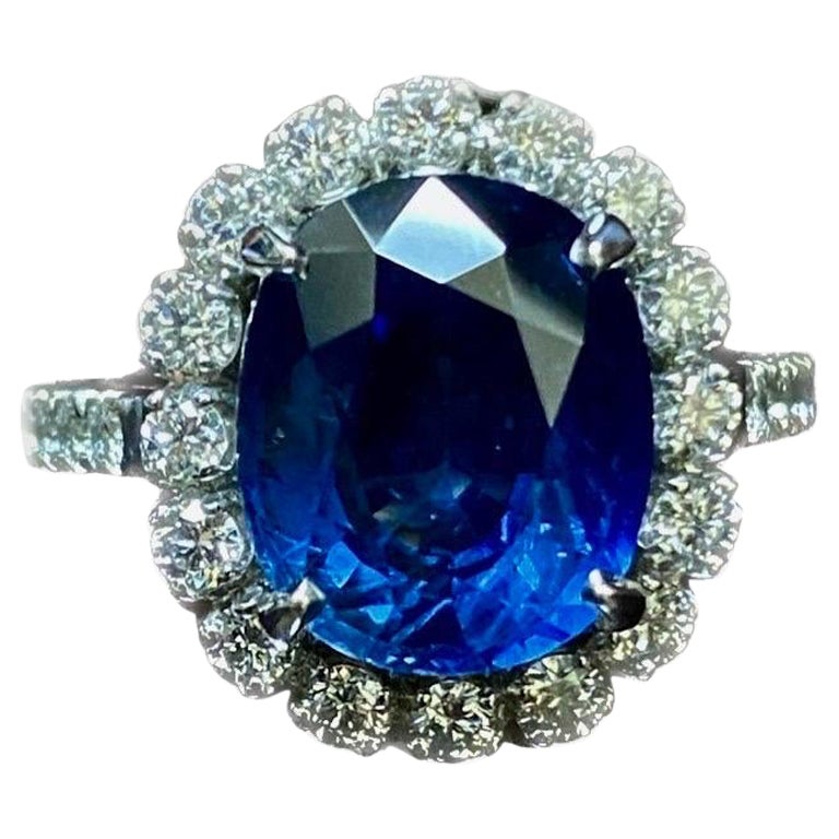 Art Deco Platinum Diamond GIA Certified 5.33 Carat Oval Blue Sapphire Engagement