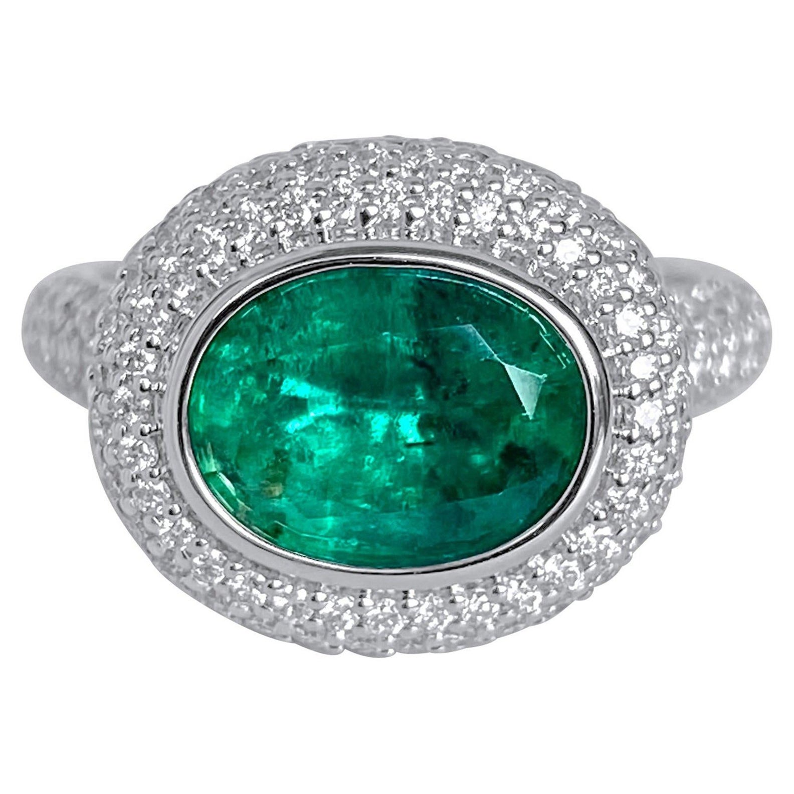 Lotus East West Ring with 3ct Emerald Solitaire, Blue Sapphire and Diamonds For Sale