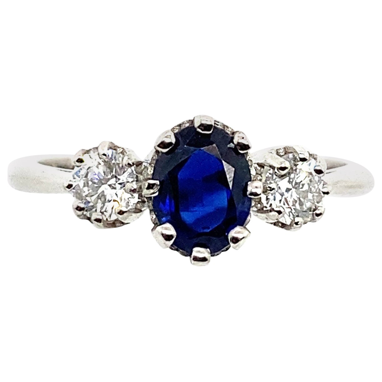 Platinum Very Finest Blue 0.81ct Sapphire 3 Stone Ring with 0.37ct of Diamonds For Sale