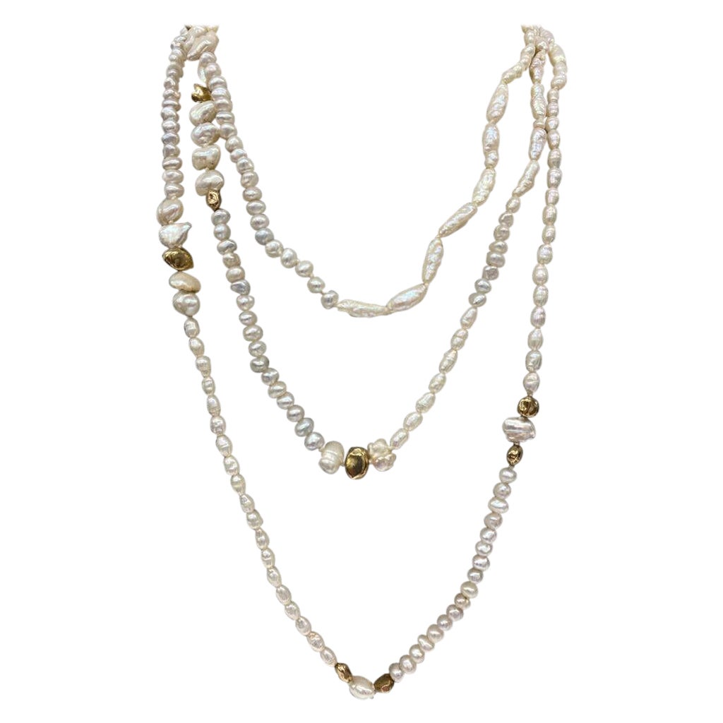 58" Long Freshwater Pearl Necklace with 14-9ct Gold Nuggets Spaces Around For Sale