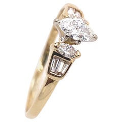 Anello solitario con diamante marquise naturale G/VS + 2 diamanti marquise abbinati