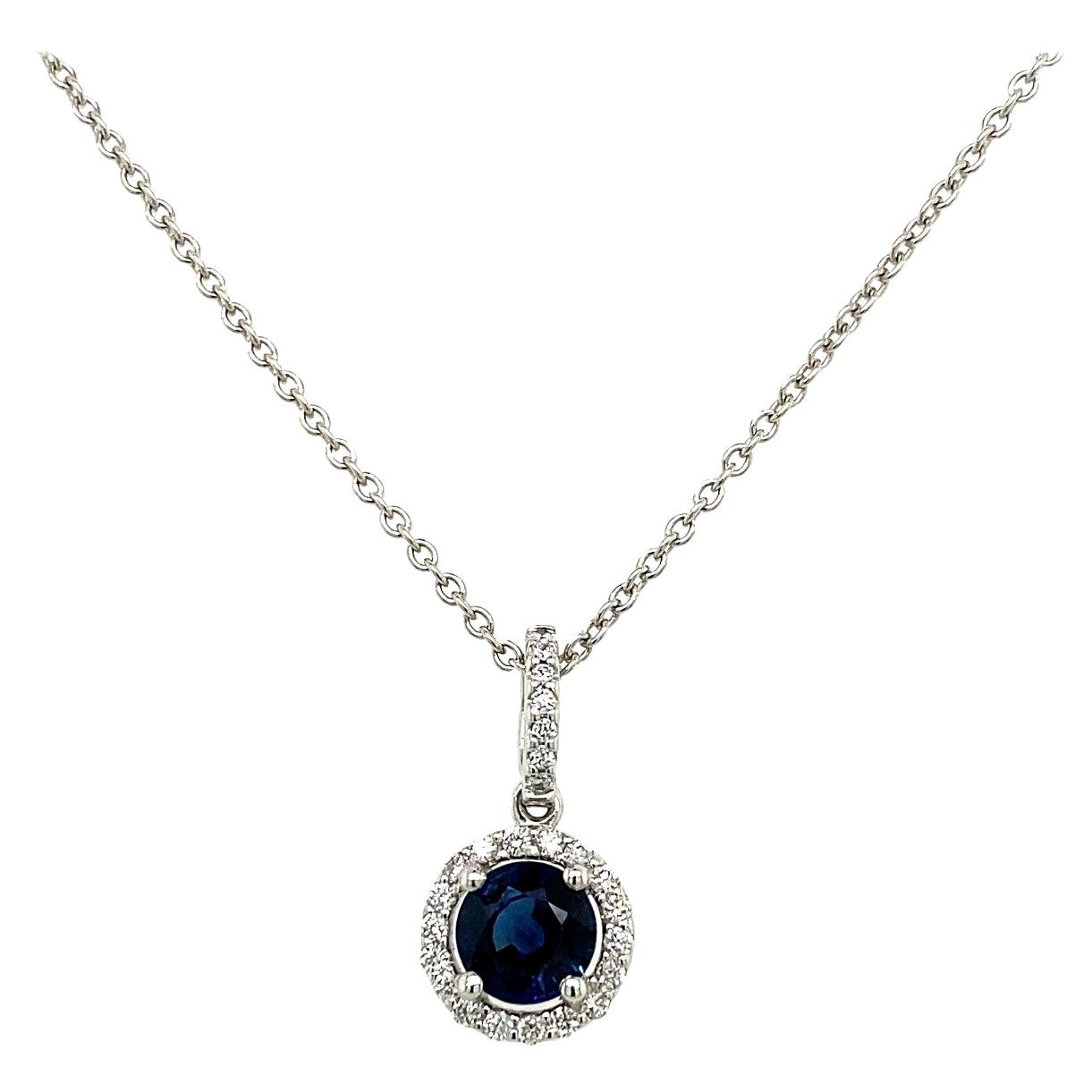0.75ct Sapphire Surrounded by Diamonds on Chain in 18ct White Gold For Sale