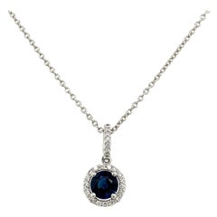 0.75ct Sapphire Surrounded by Diamonds on Chain in 18ct White Gold