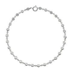 Bracelet pour femmes avec 29 diamants en or blanc 18 carats sertis sur le chaton