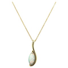 Fine Quality Marquise Shape Opal Pendant in 9ct Yellow Gold Chain