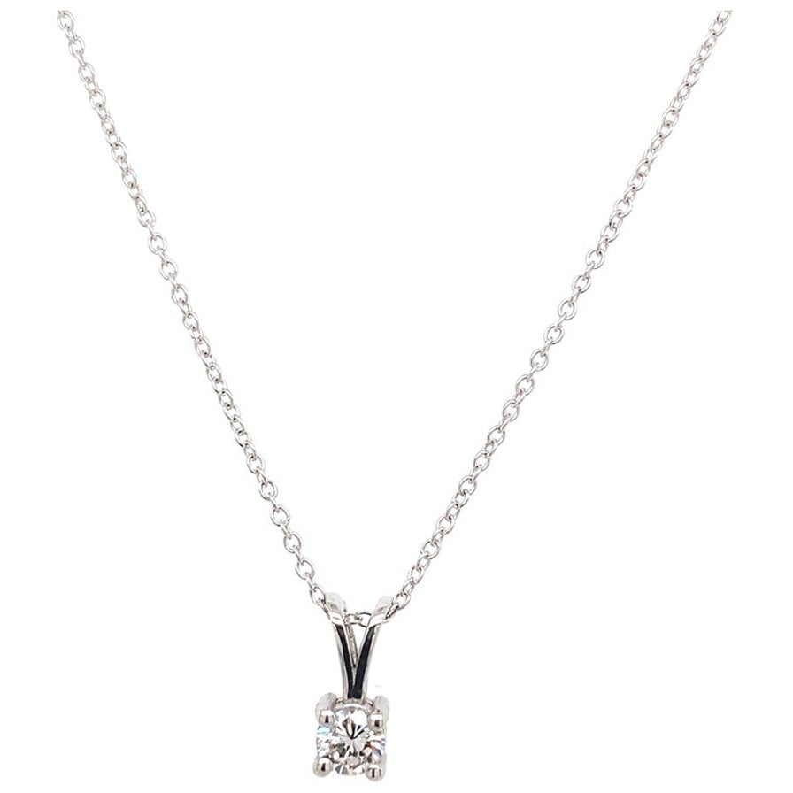 Pendentif en or blanc 18 carats avec chaîne et diamant rond de 0,18 carats taillé en brillant