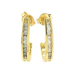 Diamant-Ohrringe Huggie aus 18 Karat Gelbgold mit 0,25 Karat Diamanten besetzt