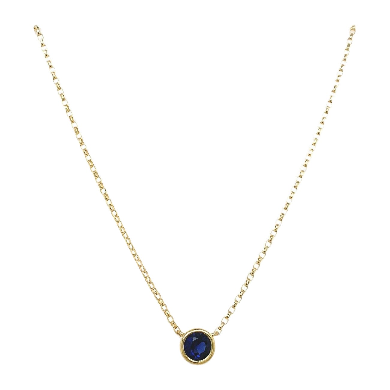 0.34ct Natural Sapphire Pendant Set on 18ct Rubover Setting in 18ct Gold Chain For Sale
