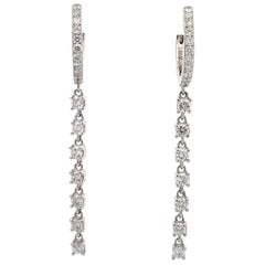 Boucles d'oreilles pendantes en or blanc 18 carats et diamants 0,93 carat