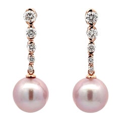 Boucles d'oreilles pendantes en perles d'eau douce roses de 0,76 carats 10-11 mm 14 carats avec diamants semi-bénisés
