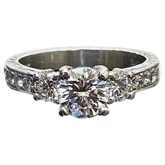 Art Deco Platinum Round D Color 0.73 Carat Three Stone Diamond Engagement Ring