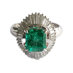 Set in PT900, 1.66 Carats, Natural Columbian Emerald & Diamonds Engagement Ring