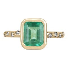 1.58tcw 14K Natural Green Emerald Cut Emerald & Diamond Shank Accent Bezel Ring