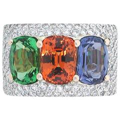 A "Samuel Getz" Blue Sapphire, Mandarin Garnet, Tsavorite & Pavé Dia Ring