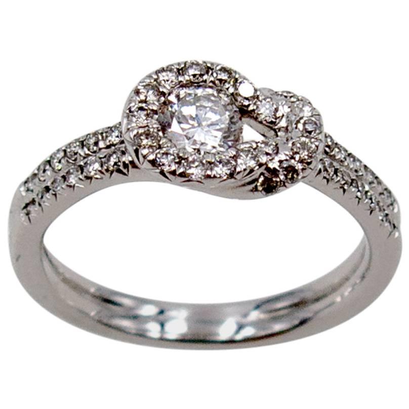 Elegant Diamond Platinum Mount Hercules Knot Ring For Sale
