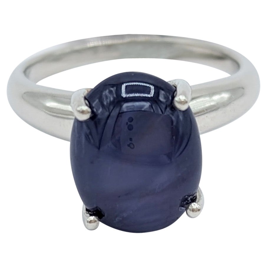 Blue Sapphire Oval Cabochon Solitaire Ring in Platinum For Sale
