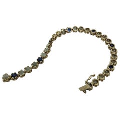 Vintage 14 Karat Yellow Gold Sapphire and Diamond Bracelet