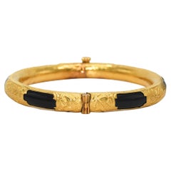 Bracciale in oro giallo 22k e onice