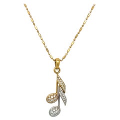 18KT Yellow /White Gold Pave' Diamond 0.88 Cts Musical Note Pendant
