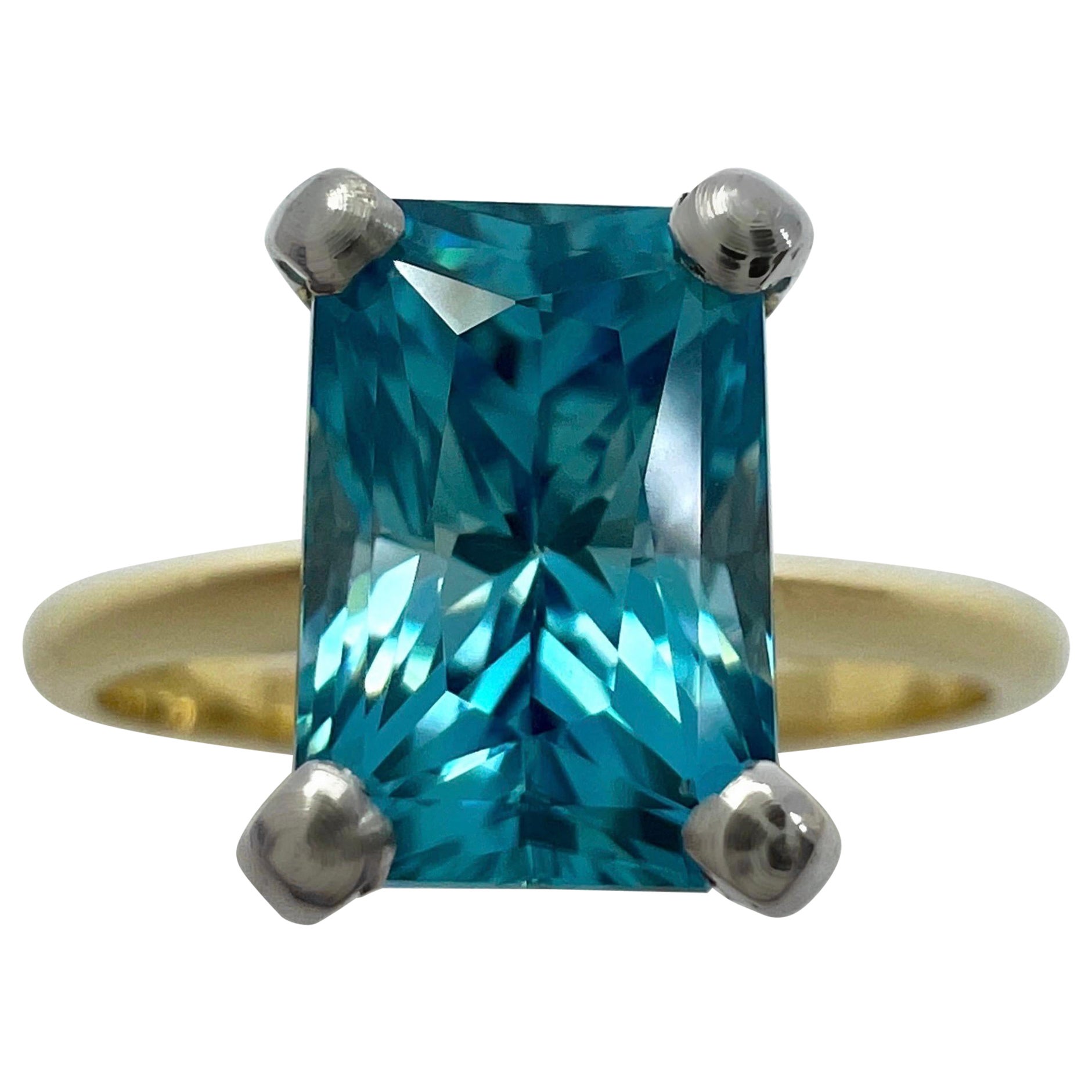 2.47ct Vivid Blue Zircon Fancy Emerald Radiant Cut 18k Gold Solitaire Ring For Sale
