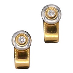 Goldene Lechic-Ohrringe mit Diamanten