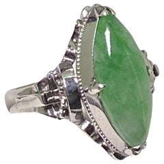 An Art-Deco c1930's Natural Marquise Shaped Jadeite Ring in 18K White Gold.