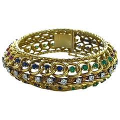 1960s Jacques Lacloche Diamond Emerald Sapphire Ruby Gold Bracelet 1