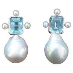 Boucles d'oreilles octogonales en or blanc Topaze bleue ciel et perles baroques en forme de poire