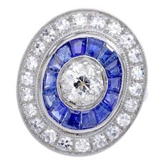 Calibrated Sapphire Diamond Platinum Engraved Ring