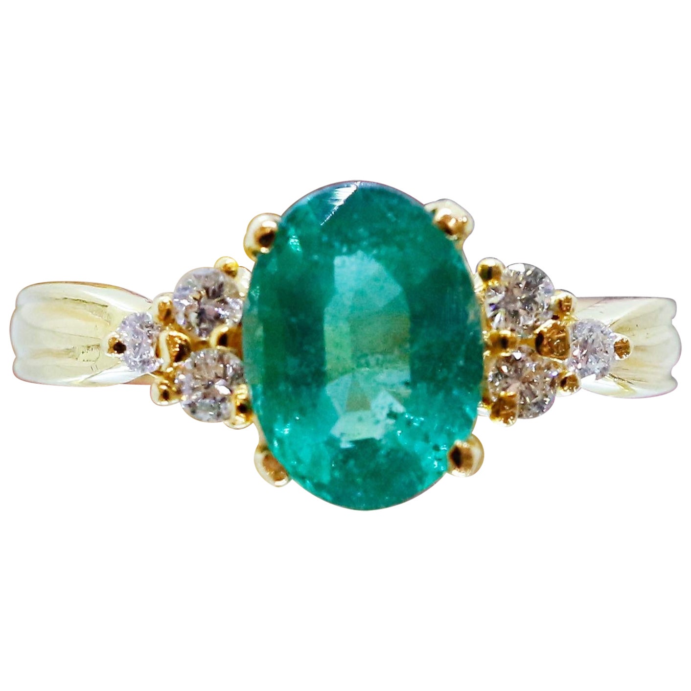 18kt emerald engagement ring