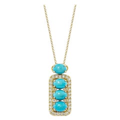 Pendentif turquoise de 4,355 carats en or jaune 18 carats avec opale et diamant blanc.